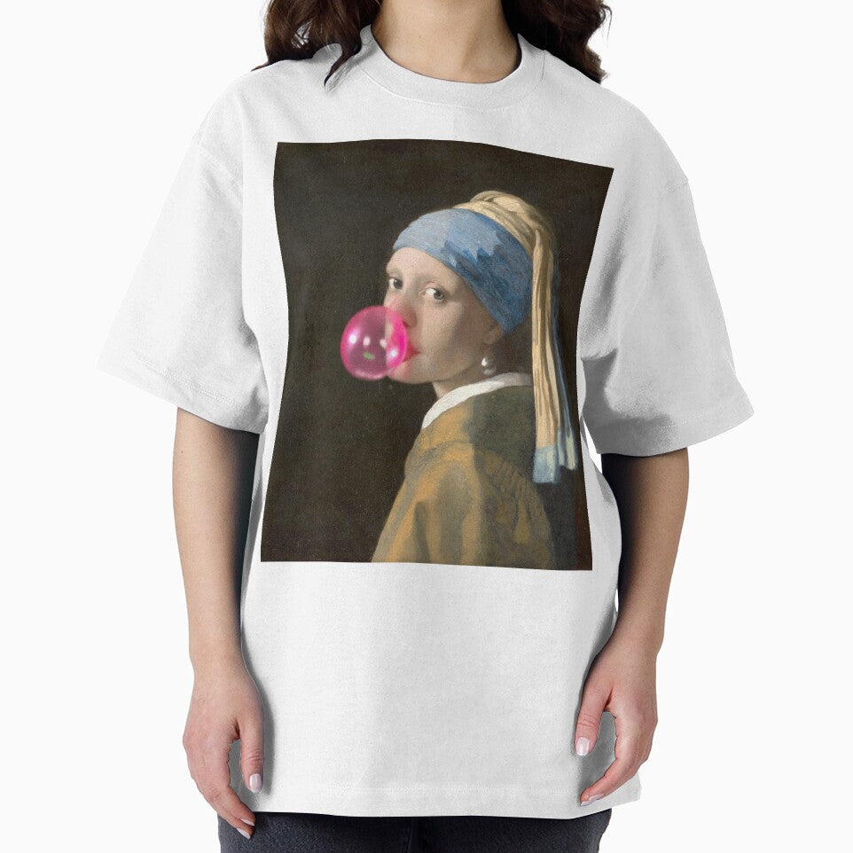 Girl with pearl earring blowing a  pink balloon by Photopat