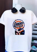 Landry Baskets Stylish Man Sitting with Basketball Graphic T-Shirt