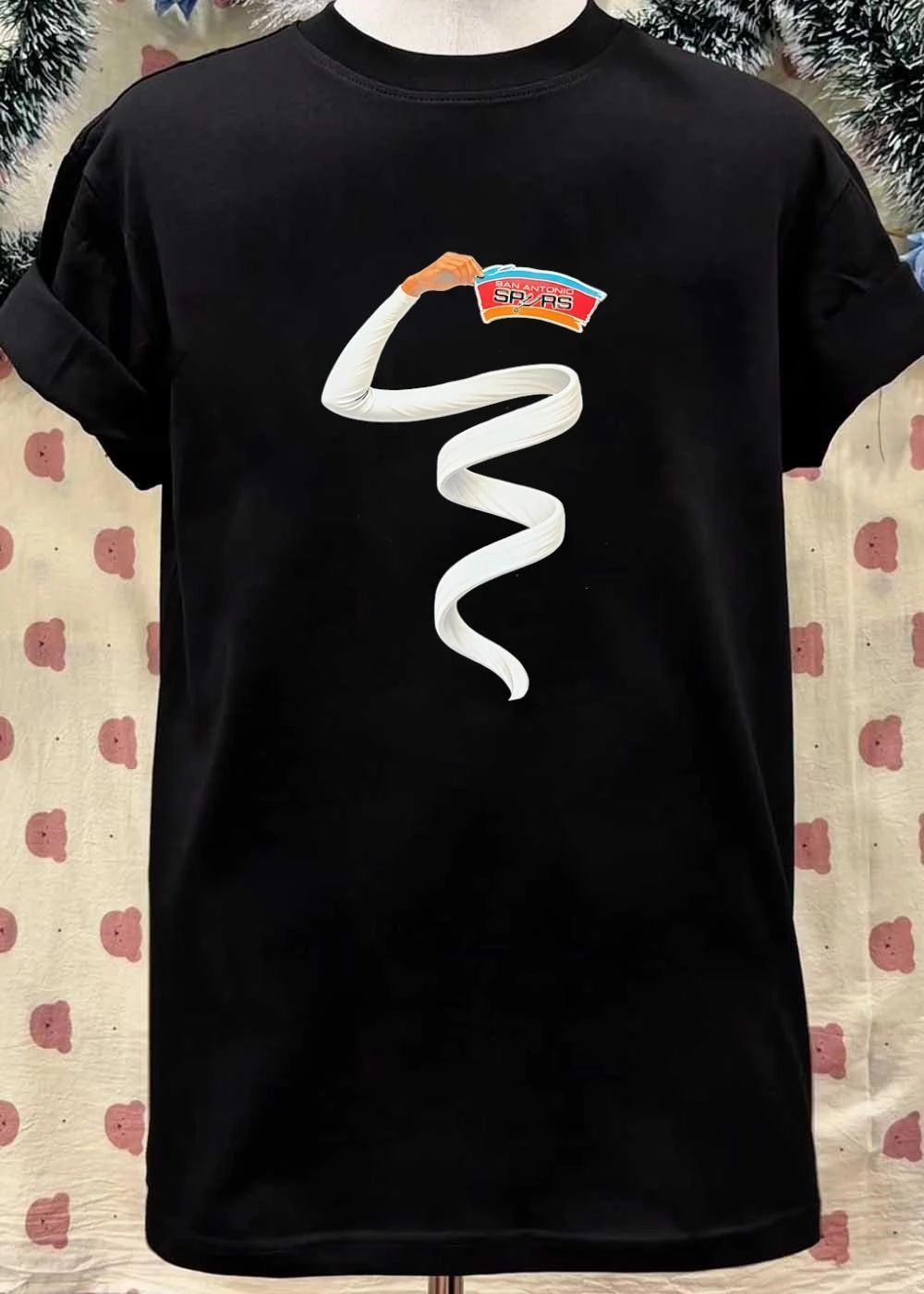 WNBA Long Arm Stretching to Hold a San Antonio Spurs T-Shirt