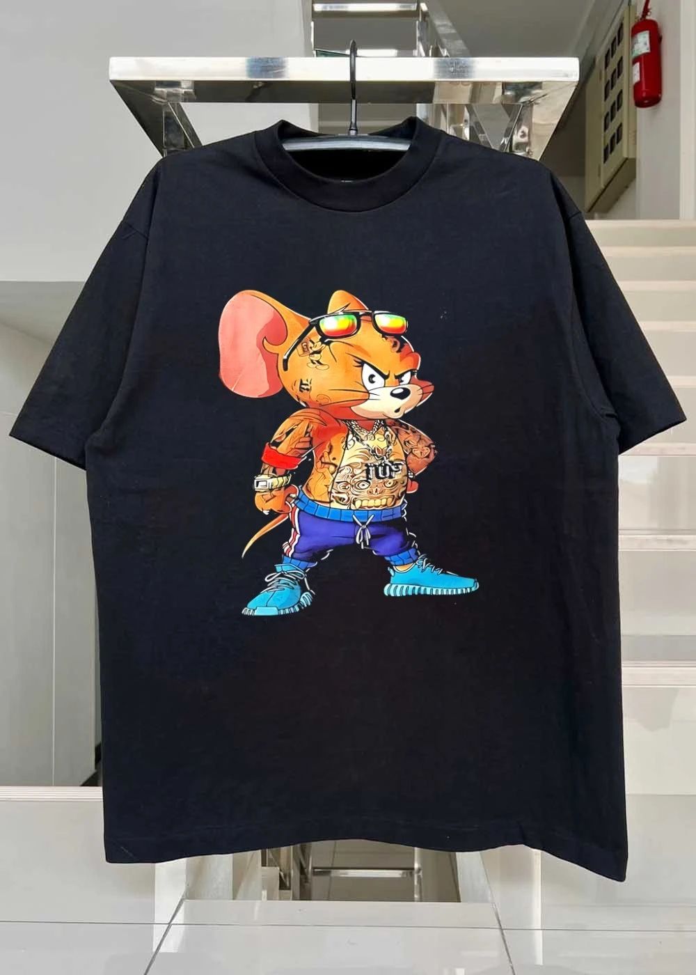 Tattooed mouse wearing sunglasses and jewelry shirt