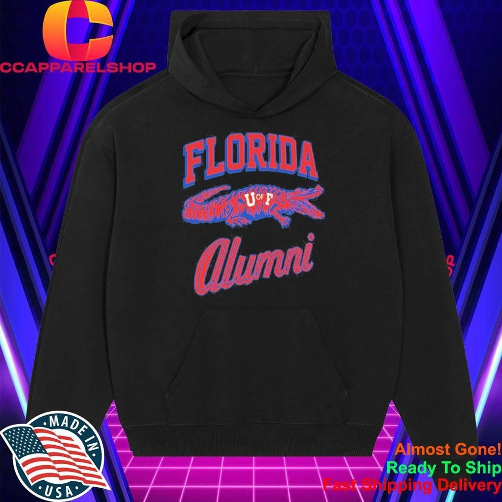 Tim Tebow Wearing University Of Florida Alumni Shirt